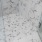 shower/tub tiles in brightly lit bathroom