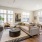 open living space with large, picture windows and access to kitchen