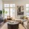 open living space with large, picture windows and access to kitchen