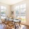 dining table adjacent to living room and kitchen