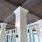 long, wide hallway brightly lit