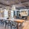 wood beam ceiling in clubhouse with fireplace, kitchen and ample seating