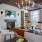 wood beam ceiling in clubhouse with fireplace and ample seating