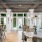 wood beam ceiling in clubhouse with fireplace and ample seating