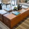 wood beam ceiling in clubhouse with fireplace and ample seating