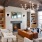 wood beam ceiling in clubhouse with fireplace and ample seating