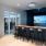 large screen and faux green in golf simulation room